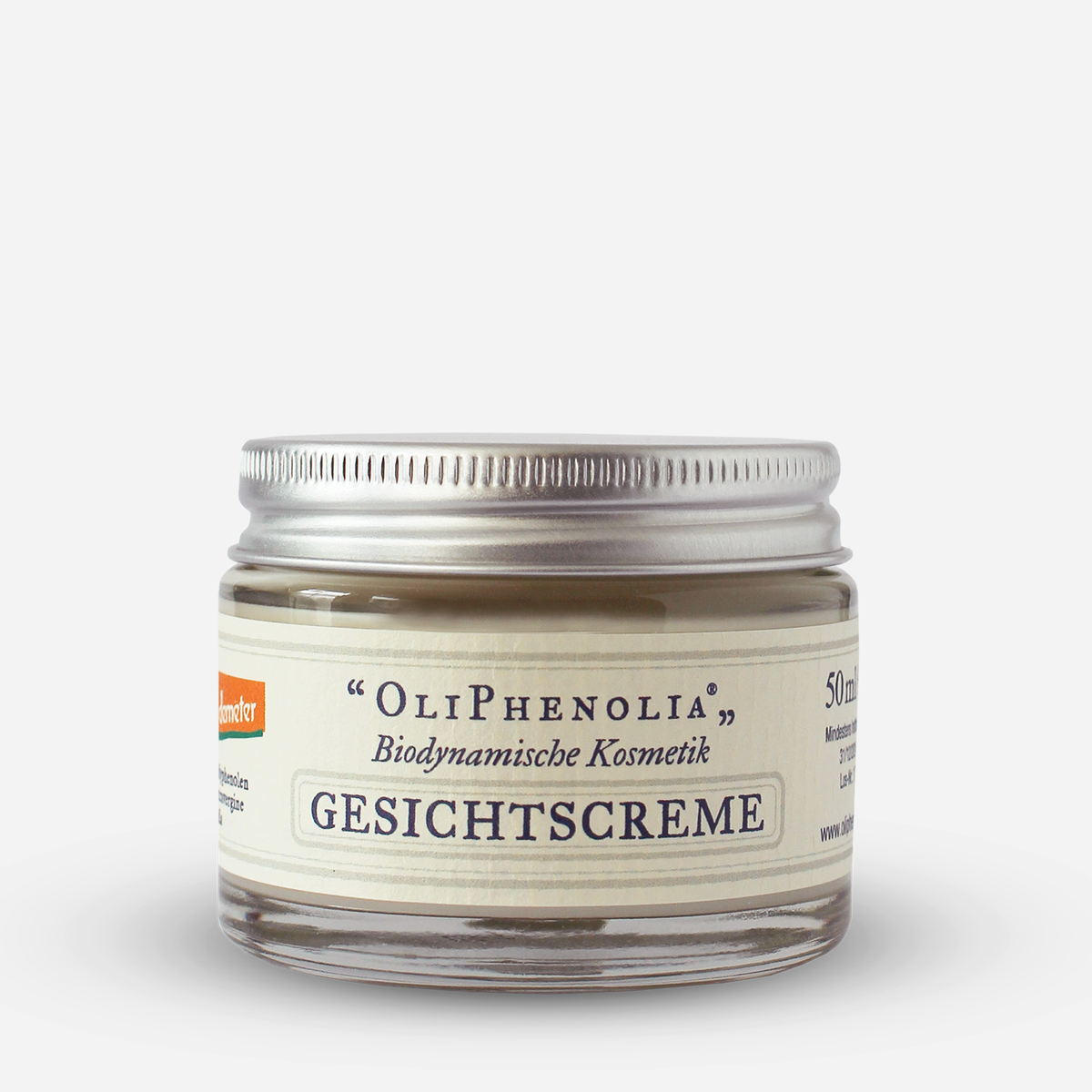 Glasbehälter der biodynamischen Gesichtscreme "OliPhenolia®" von Demeter mit silberfarbenem Schraubdeckel. Aufschrift: „Biodynamische Kosmetik – GESICHTSCREME“, Inhalt: 50 ml.