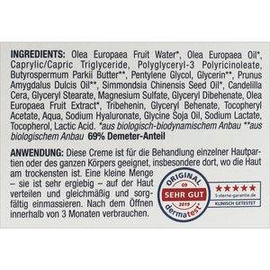 Inhaltsstoffe und Anwendungshinweise der OliPhenolia® Intensiv-Pflegecreme für Gesicht und Körper auf der Rückseite der Verpackung, inklusive Dermatest-Siegel „Sehr gut“ von 2019.